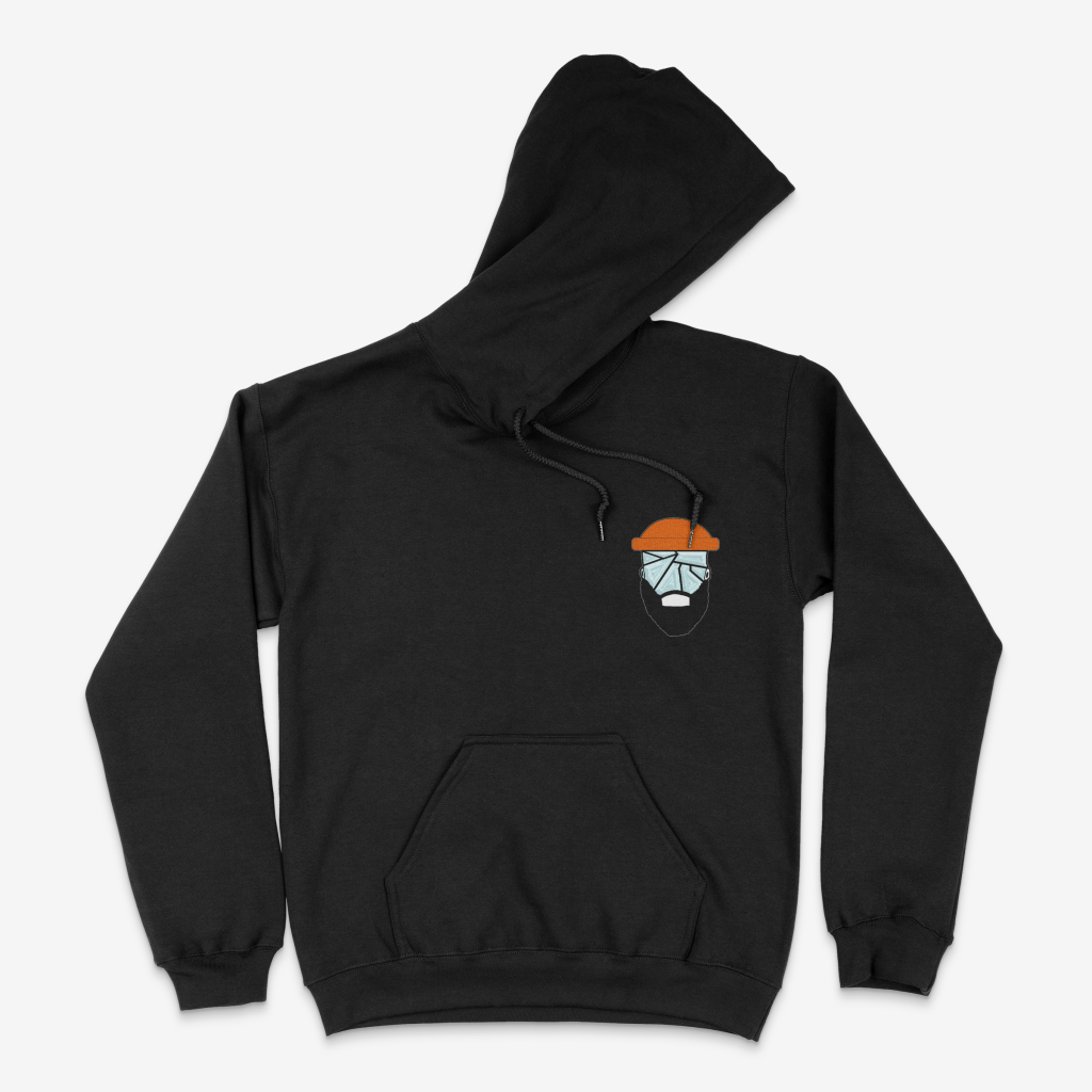 Front view of black hoodie featuring The Shattered Man logo with an orange beanie and shattered glass face.