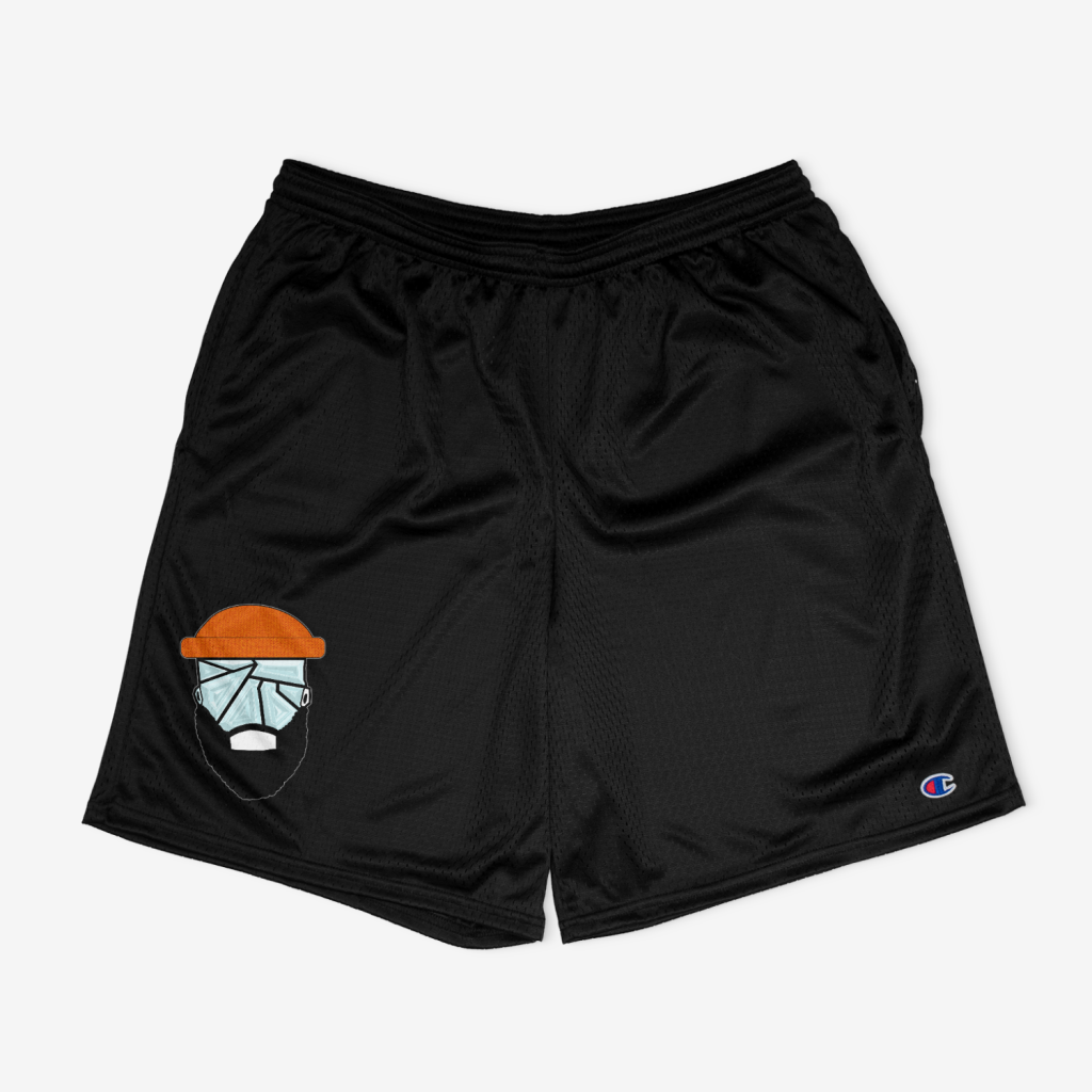 Champion mesh shorts featuring a fractured face logo with an orange hat on the left leg.